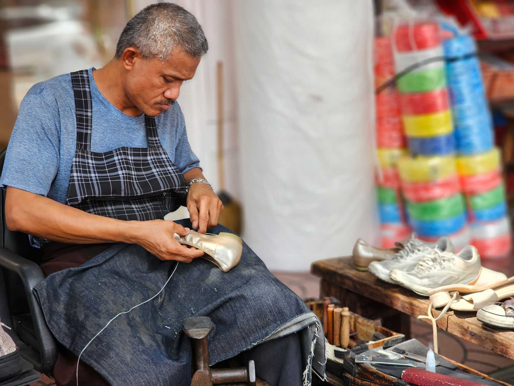 Close work with the hands at a repair bench